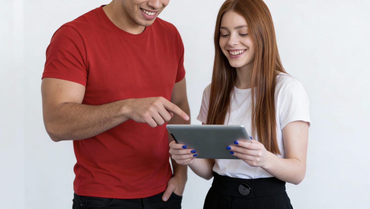 A team collaborating over a tablet after a website migration.